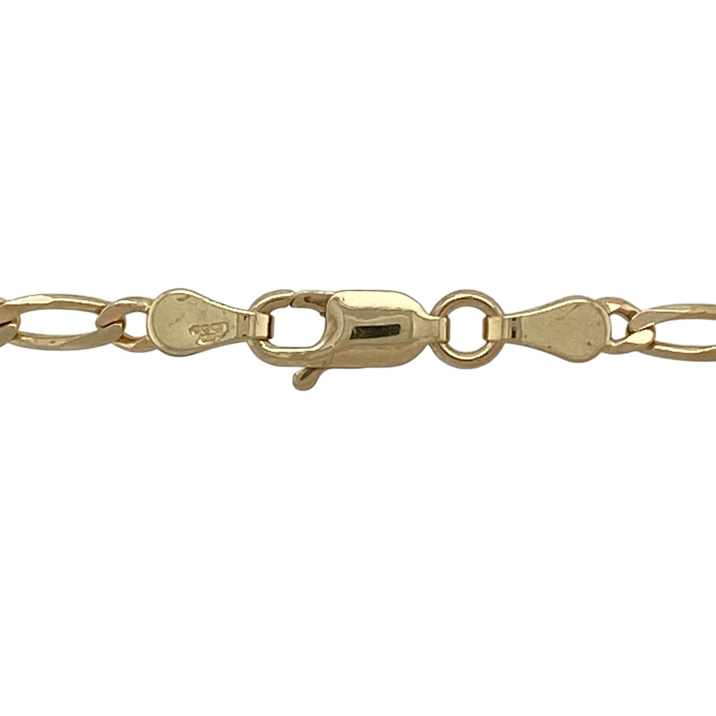 Add a classic and versatile staple to your jewellery collection with this pre-owned 9ct yellow gold Figaro chain, offering timeless styling and everyday durability—perfect worn alone or layered with pendants.

Design: The chain features the traditional Figaro link pattern, combining shorter and longer links for a distinctive and elegant look, with a slim link width of approximately 2mm.