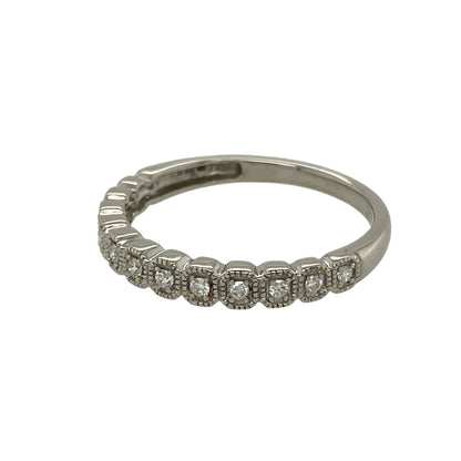 Add refined texture and subtle sparkle to your jewellery collection with this pre-owned 9ct white gold and diamond beaded edge set band ring, offering an elegant design with timeless appeal—perfect for everyday wear or stacking.

Design: The ring features a slim band with a front width of approximately 3mm, highlighted by delicate beaded edges and diamond detailing for a refined finish.