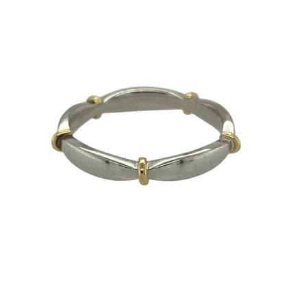 Add understated elegance and refined two-tone detail to your jewellery collection with this pre-owned 18ct white gold band ring, featuring subtle yellow gold accents and a timeless design—perfect for everyday wear or stacking.

Design: The ring features a clean, classic band style with a width of approximately 3mm, enhanced by delicate yellow gold detailing that adds contrast and visual interest.