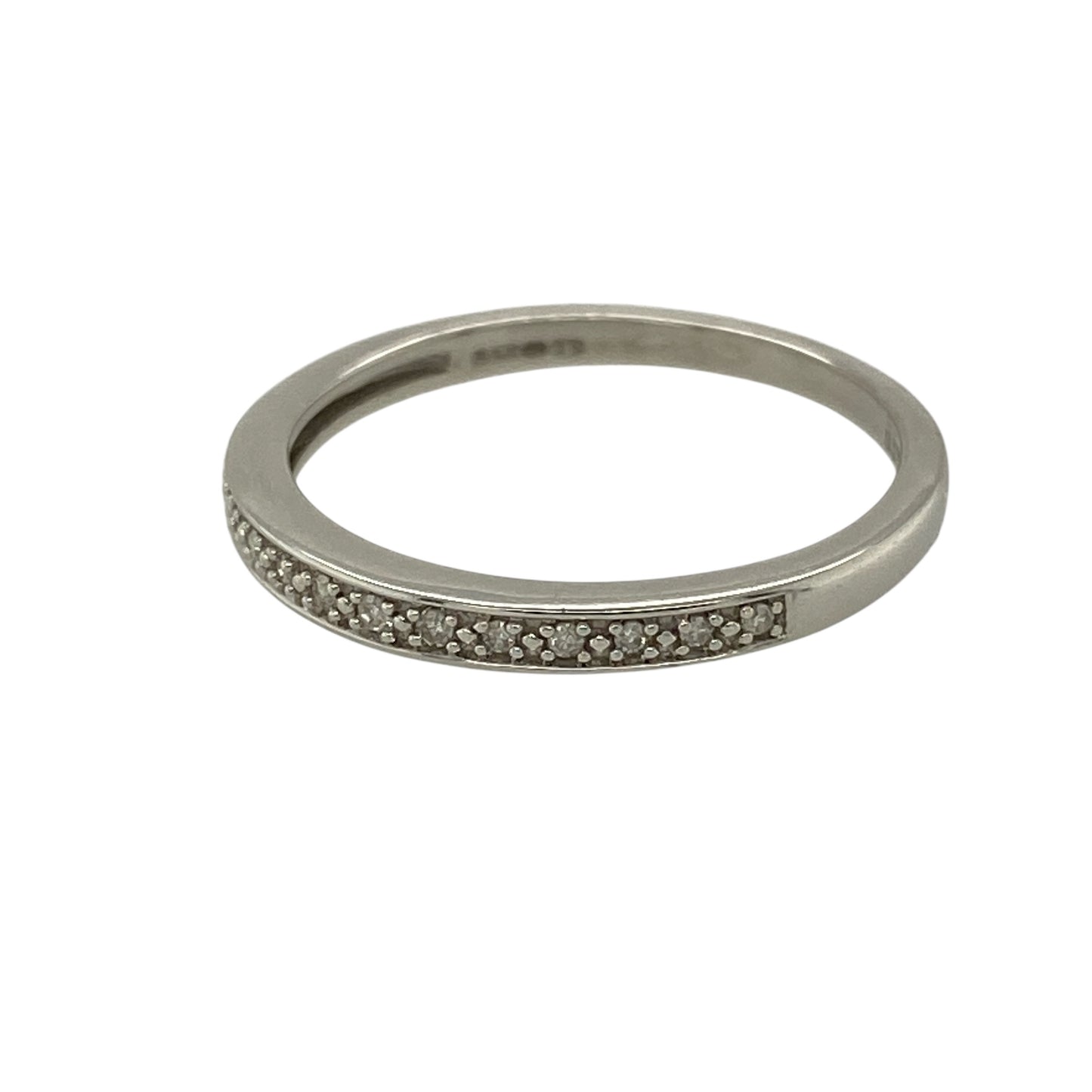 Add subtle sparkle and clean-lined elegance to your jewellery collection with this pre-owned 9ct white gold and diamond set band ring, offering a refined design with everyday versatility—perfect for stacking or wearing alone.

Design: The ring features a slim band with a front width of approximately 2mm, accented with diamond detailing for a delicate touch of brilliance.
Material: Made from 9-carat white gold, the cool polished finish beautifully complements the sparkle of the diamonds.
