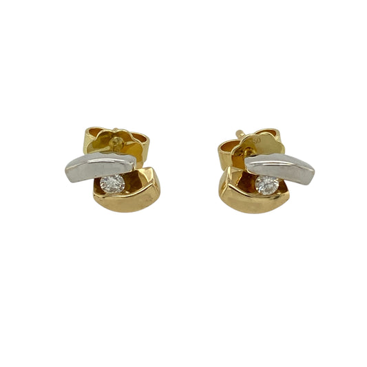 Add elegant movement and refined sparkle to your jewellery collection with this pre-owned 18ct yellow and white gold and diamond set swirl stud earrings, offering timeless two-tone style—perfect for everyday wear or special occasions.

Design: The earrings feature a graceful swirl motif, combining flowing lines with diamond detailing for a soft yet eye-catching finish.