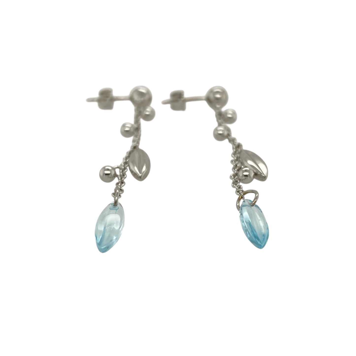 Add graceful movement and soft colour to your jewellery collection with this pre-owned 9ct white gold and blue stone long chain drop earrings, offering an elegant and contemporary design—perfect for evening wear or refined everyday styling.

Design: The earrings feature a long chain drop design accented with blue stones, creating a fluid silhouette with gentle movement and a touch of colour.