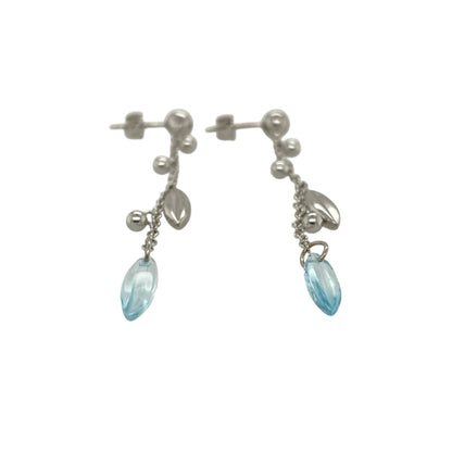 Add graceful movement and soft colour to your jewellery collection with this pre-owned 9ct white gold and blue stone long chain drop earrings, offering an elegant and contemporary design—perfect for evening wear or refined everyday styling.

Design: The earrings feature a long chain drop design accented with blue stones, creating a fluid silhouette with gentle movement and a touch of colour.