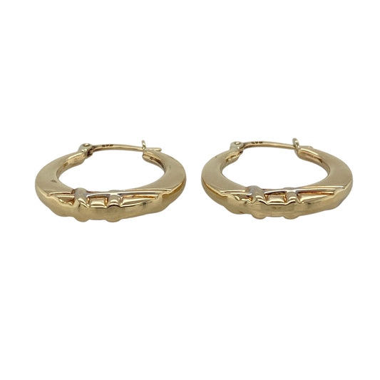 Add subtle texture and classic two-tone style to your jewellery collection with this pre-owned 9ct yellow and white gold criss cross line patterned hoop creole earrings, offering timeless elegance with refined detail—perfect for everyday wear.

Design: The earrings feature a classic hoop creole shape decorated with a criss cross line pattern, combining yellow and white gold tones for added depth and visual interest.