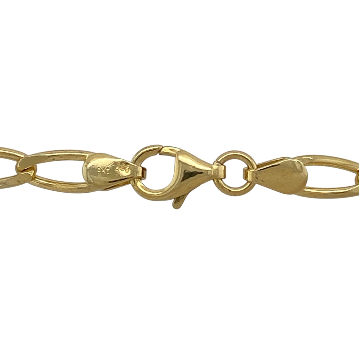 Add a bold and classic statement to your jewellery collection with this pre-owned 9ct yellow gold open curb chain, offering timeless styling with a strong, substantial presence—perfect for everyday wear or standout layering.

Design: The chain features a traditional open curb link pattern with a generous link width of approximately 5mm, creating a striking and confident look.
Material: Made from 9-carat yellow gold, the warm polished finish enhances the bold links and classic curb style.