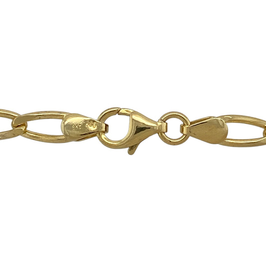 Add a bold and classic statement to your jewellery collection with this pre-owned 9ct yellow gold open curb chain, offering timeless styling with a strong, substantial presence—perfect for everyday wear or standout layering.

Design: The chain features a traditional open curb link pattern with a generous link width of approximately 5mm, creating a striking and confident look.
Material: Made from 9-carat yellow gold, the warm polished finish enhances the bold links and classic curb style.