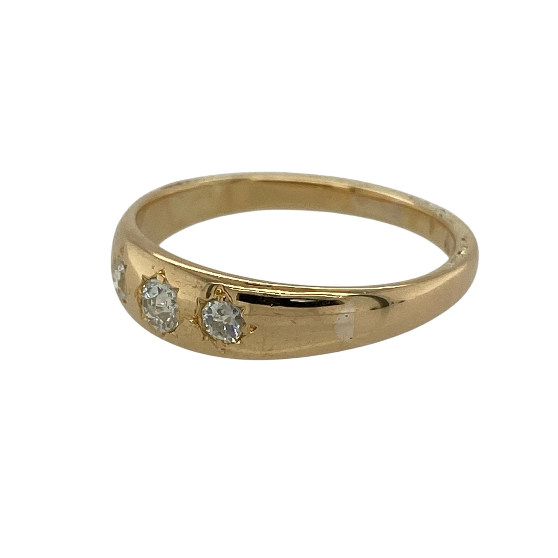 Add classic elegance and refined sparkle to your jewellery collection with this pre-owned 18ct yellow gold and diamond set trilogy band ring, offering a timeless design with a balanced, elegant profile—perfect for everyday wear or special occasions.

Design: The ring features a trilogy-style arrangement of diamonds set across the front of the band, which measures approximately 5mm in width, creating a strong and symmetrical focal point.