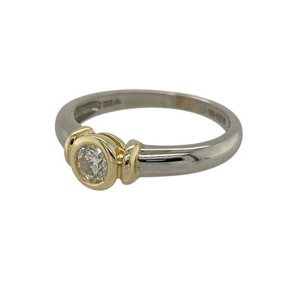 Add refined contrast and classic sparkle to your jewellery collection with this pre-owned 9ct white gold and yellow gold set diamond solitaire ring, offering timeless elegance with a distinctive two-tone finish—perfect for special occasions or everyday wear.

Design: The ring features a single brilliant-cut diamond with an approximate weight of 0.25ct, presented in a classic solitaire style that highlights its sparkle and clean lines.