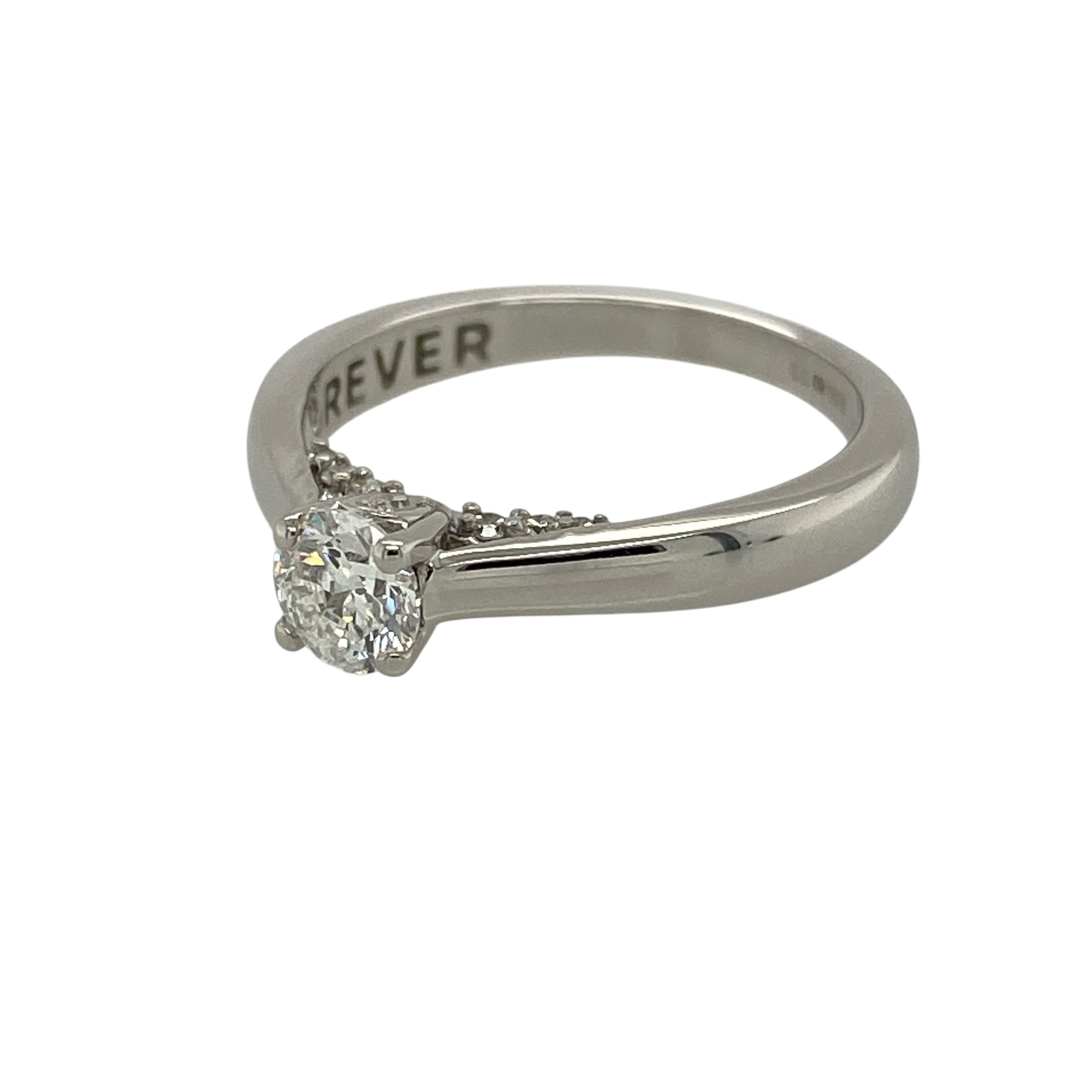 Add refined luxury and thoughtful detail to your jewellery collection with this pre-owned 18ct white gold and diamond set solitaire ring, offering classic elegance with a hidden touch of sparkle—perfect for engagements or special occasions.

Design: The ring features a single brilliant-cut diamond with an approximate weight of 0.45ct, presented in a timeless solitaire style that showcases the diamond’s brilliance and fire.