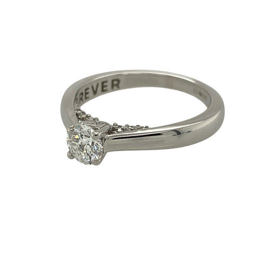 Add refined luxury and thoughtful detail to your jewellery collection with this pre-owned 18ct white gold and diamond set solitaire ring, offering classic elegance with a hidden touch of sparkle—perfect for engagements or special occasions.

Design: The ring features a single brilliant-cut diamond with an approximate weight of 0.45ct, presented in a timeless solitaire style that showcases the diamond’s brilliance and fire.