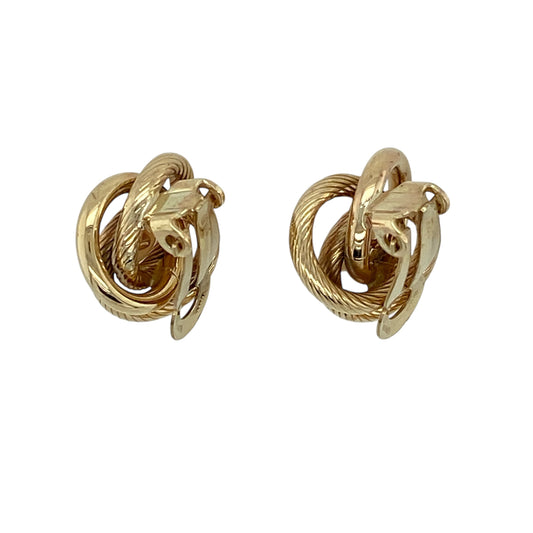 Add classic elegance and timeless charm to your jewellery collection with this pre-owned 9ct yellow gold and pearl set knot clip-on earrings, offering a refined design with graceful detail—perfect for vintage styling or elegant everyday wear.

Design: The earrings feature a traditional knot motif accented with lustrous pearls, each measuring approximately 7mm in diameter, creating a sophisticated and well-balanced look.