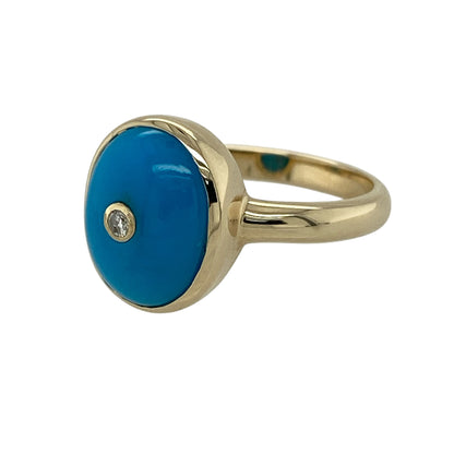 Add vibrant colour and classic charm to your jewellery collection with this pre-owned 9ct yellow gold diamond and turquoise coloured stone set ring, offering a bold focal point with refined detail—perfect for statement wear or everyday elegance.

Design: The ring features a striking oval turquoise coloured stone measuring approximately 12mm by 10mm, finished with a small diamond set at the centre for subtle sparkle and contrast.