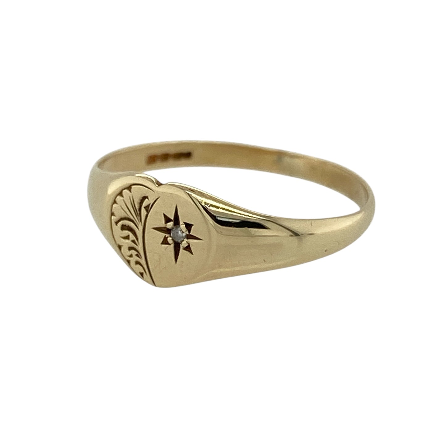 Add a touch of charm and sentiment to your jewellery collection with this pre-owned 9ct yellow gold and diamond patterned heart signet ring, offering delicate sparkle and a timeless design—perfect for everyday wear or a thoughtful gift.

Design: This ring features a heart-shaped signet front with a subtle patterned finish, accented by a small diamond that adds a gentle touch of brilliance to the design.