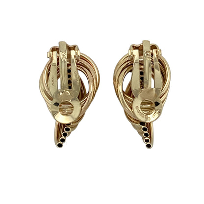 Add classic texture and effortless elegance to your jewellery collection with this pre-owned 9ct yellow gold tube twist style clip on earrings, offering a timeless design with a comfortable, secure fit.

Design: These earrings feature a tube twist style, creating a subtle yet eye-catching textured look that adds interest while remaining easy to wear.
Material: Made from 9-carat yellow gold, the warm polished finish enhances the twisted form and gives the earrings a traditional appeal.