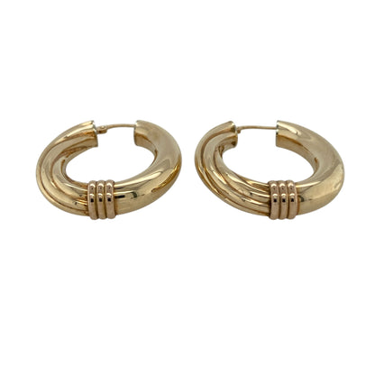 Add bold elegance and two-tone appeal to your jewellery collection with this pre-owned 9ct yellow and rose gold twisted large oval creole earrings, offering a striking design with classic charm.

Design: These large oval creole earrings feature a twisted profile that blends yellow and rose gold tones, creating depth, contrast, and eye-catching visual interest.
Material: Made from 9-carat yellow and rose gold, the warm mixed-metal finish enhances the twisted detailing and adds a distinctive, luxurious look.