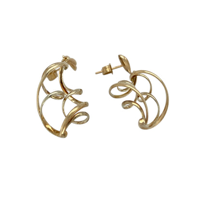 Add flowing elegance and classic charm to your jewellery collection with this pre-owned 9ct yellow gold swirl twist drop earrings, offering graceful movement and a timeless design.

Design: These drop earrings feature a swirl twist form, creating a fluid and eye-catching silhouette that moves beautifully when worn.
Material: Made from 9-carat yellow gold, the warm polished finish enhances the flowing curves and highlights the elegant shape.