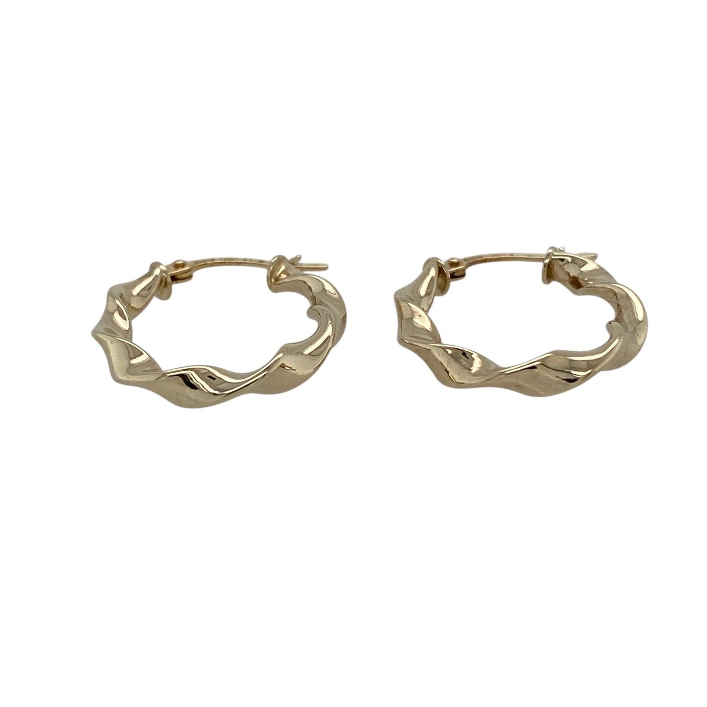 Add classic texture and timeless elegance to your jewellery collection with this pre-owned 9ct yellow gold twisted oval creole earrings, offering a lightweight yet refined design.

Design: These creole earrings feature an oval hoop shape with a twisted profile, creating subtle texture and visual interest while maintaining a traditional silhouette.
Material: Made from 9-carat yellow gold, the warm polished finish enhances the twisted detailing and gives the earrings lasting appeal.