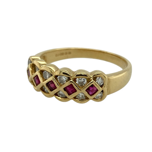 Add rich colour and elegant detail to your jewellery collection with this pre-owned 18ct yellow gold diamond and ruby lattice design band ring, offering a striking look with classic appeal.

Design: This band ring features a decorative lattice-style front measuring approximately 7mm in width, showcasing a combination of rubies and diamonds arranged to create depth, texture, and visual interest.