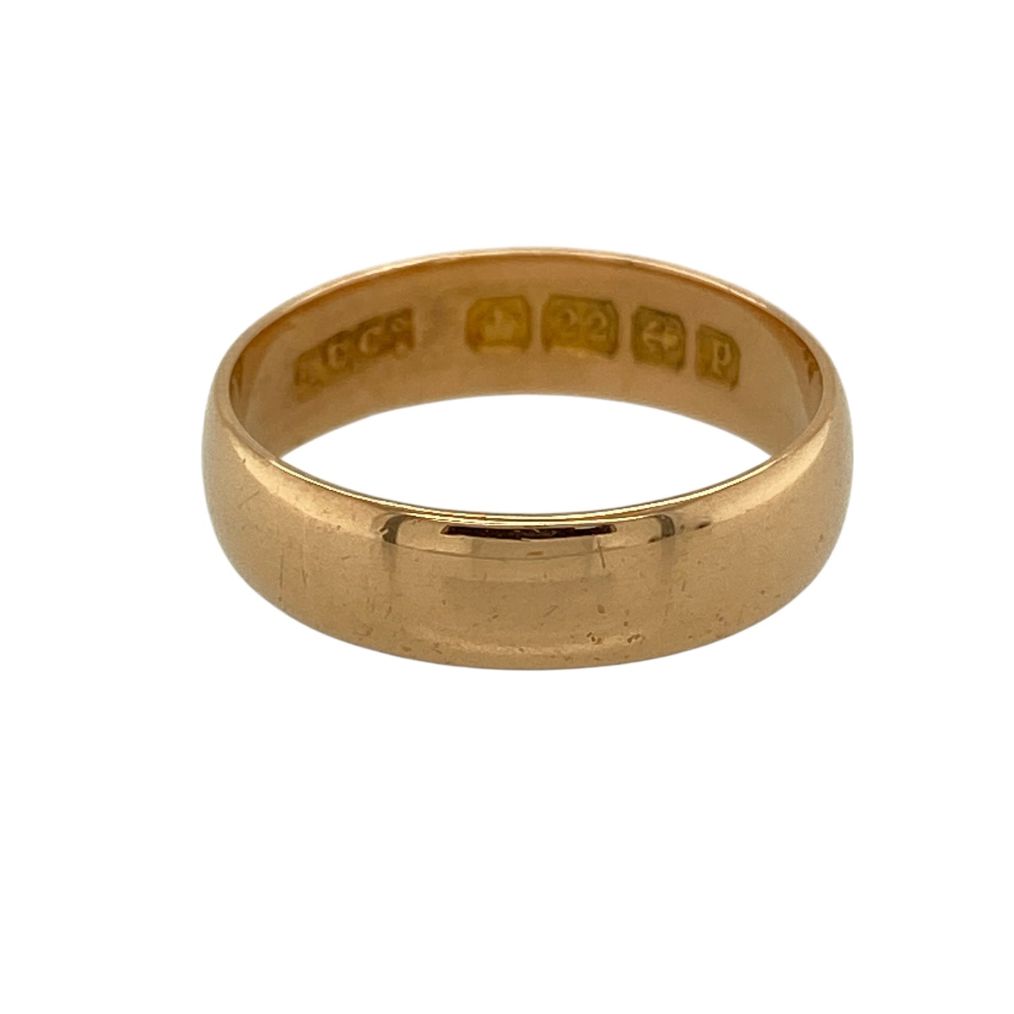 Celebrate rich gold tones and timeless simplicity with this pre-owned 22ct yellow gold wedding band ring, offering a classic design with a bold, traditional finish.

Design: This ring features a smooth, plain band with a 5mm profile, giving it a strong and well-balanced appearance that suits everyday wear.
Material: Made from 22-carat yellow gold, the high gold content delivers a rich, warm colour and a distinctive traditional look.