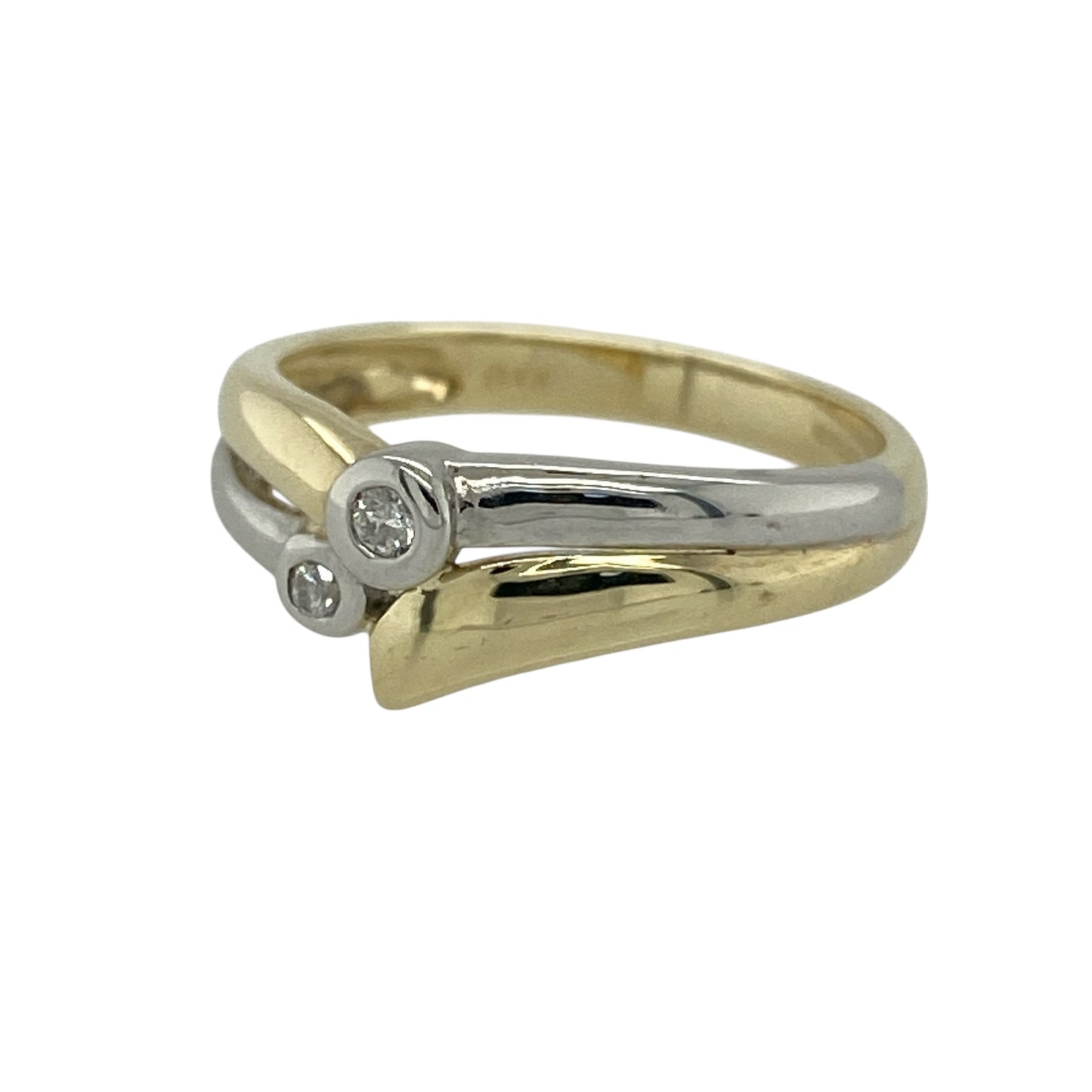 Add elegant contrast and subtle sparkle to your jewellery collection with this pre-owned 9ct yellow and white gold diamond wishbone style band ring, offering a graceful and contemporary design.

Design: This ring features a wishbone-style profile with double overlapping bands, creating a flowing and balanced look. Two diamonds accent the design, adding gentle sparkle while enhancing the elegant crossover form.