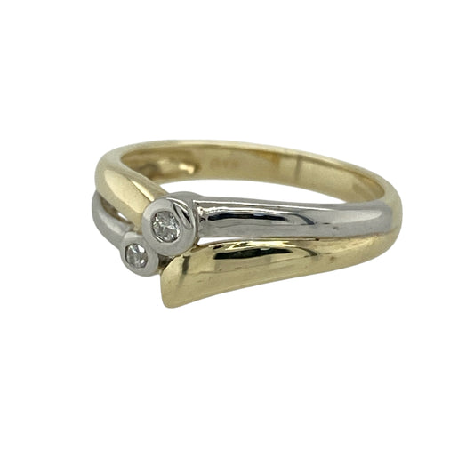 Add elegant contrast and subtle sparkle to your jewellery collection with this pre-owned 9ct yellow and white gold diamond wishbone style band ring, offering a graceful and contemporary design.

Design: This ring features a wishbone-style profile with double overlapping bands, creating a flowing and balanced look. Two diamonds accent the design, adding gentle sparkle while enhancing the elegant crossover form.