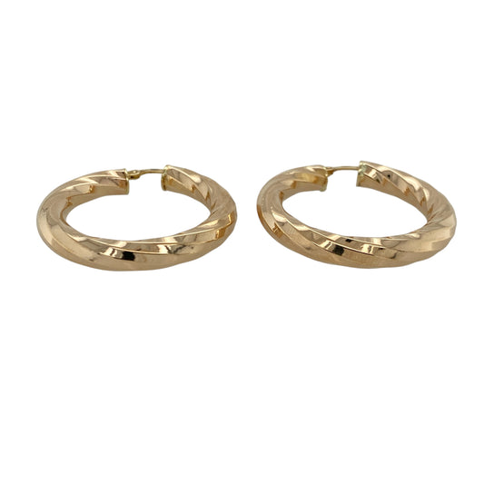Add bold texture and timeless elegance to your jewellery collection with this pre-owned 9ct yellow gold twisted hoop creole earrings, offering classic design with a substantial feel.

Design: These creole earrings feature a twisted hoop profile, creating eye-catching texture and depth while maintaining a traditional silhouette.
Material: Made from 9-carat yellow gold, the warm polished finish enhances the twisted detailing and gives the earrings lasting appeal.