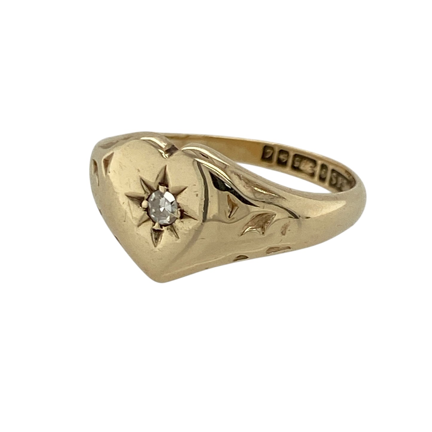 Add sentimental charm and classic sparkle to your jewellery collection with this pre-owned 9ct yellow gold diamond heart signet ring, offering timeless design with elegant detail.

Design: This ring features a heart-shaped signet front measuring approximately 10mm in height, with a diamond accent adding a touch of refined sparkle to the centre.
Material: Made from 9-carat yellow gold, the warm polished finish enhances the heart motif and gives the ring a traditional yet elegant appearance.