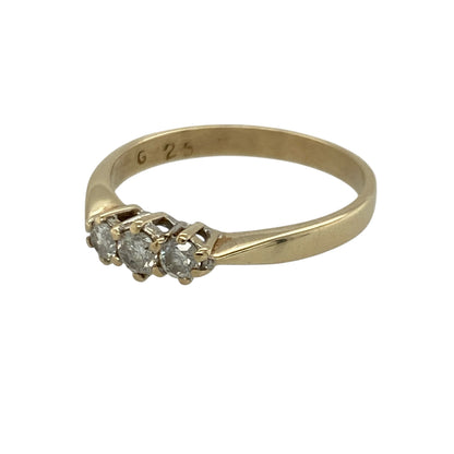 Add timeless sparkle and elegant meaning to your jewellery collection with this pre-owned 18ct yellow gold diamond trilogy ring, offering classic design with refined brilliance.

Design: This ring features a traditional trilogy arrangement, with three diamonds displayed across the front to create a balanced and elegant focal point.
Material: Made from luxurious 18-carat yellow gold, the warm polished finish beautifully complements the sparkle of the diamonds and enhances the classic styling.