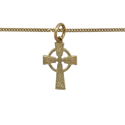 Add symbolic heritage and timeless detail to your jewellery collection with this pre-owned 9ct yellow gold patterned Celtic cross necklace, offering classic design with meaningful character.

Design: This pendant features a Celtic cross motif with patterned detailing, creating a distinctive and decorative look rooted in tradition. The pendant measures approximately 2.3cm in length including the bail, giving it a refined yet noticeable presence.
