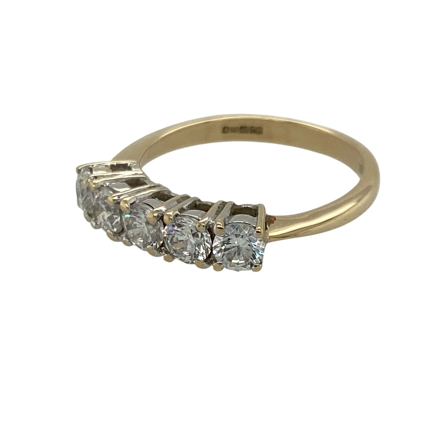 Add classic sparkle and timeless elegance to your jewellery collection with this pre-owned 9ct yellow gold cubic zirconia band ring, offering refined brilliance in a balanced design.

Design: This band ring features five round cubic zirconia stones, each measuring approximately 4mm in diameter, arranged across the front to create a bright and eye-catching display.