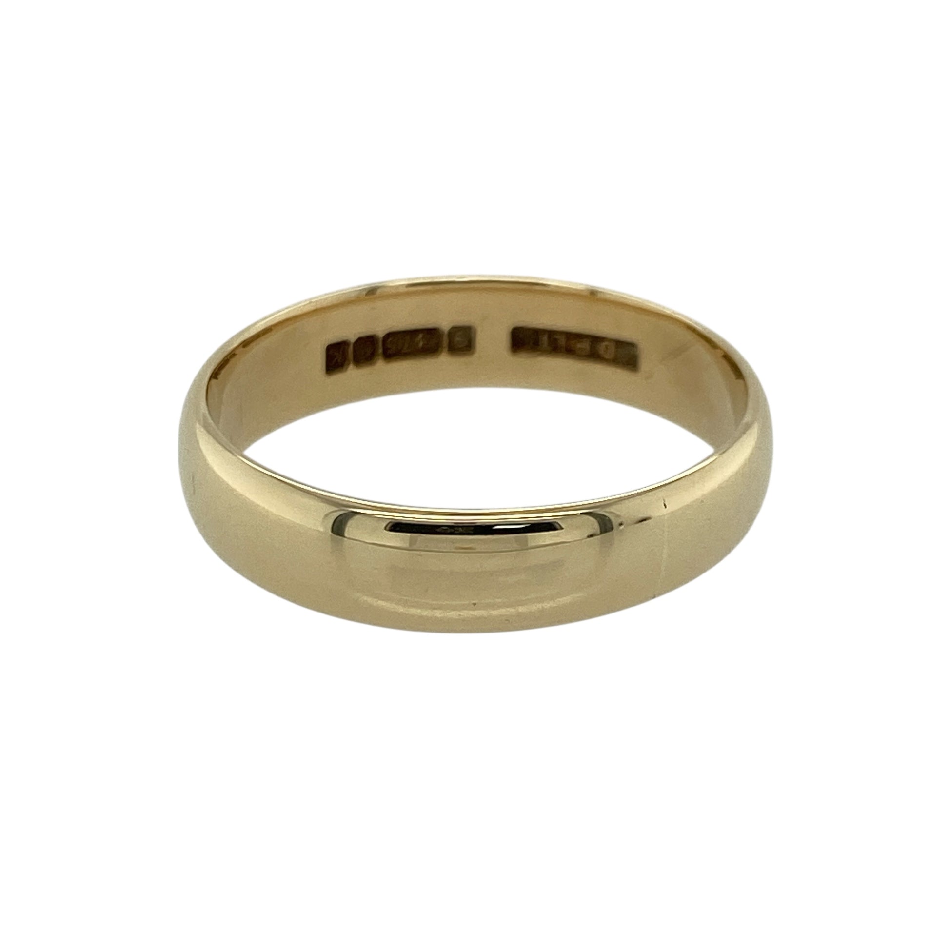 Embrace classic style with this pre-owned 9ct yellow gold 5mm wedding band ring, offering a timeless and versatile design suited to both everyday wear and special occasions. A traditional choice ideal as a wedding ring or substantial stacking band.

Design: The ring features a 5mm wide band, giving it a strong and well-balanced profile on the finger. The smooth, rounded edges create a clean and classic silhouette that pairs effortlessly with engagement rings or can be worn alone for a bold, simple look.