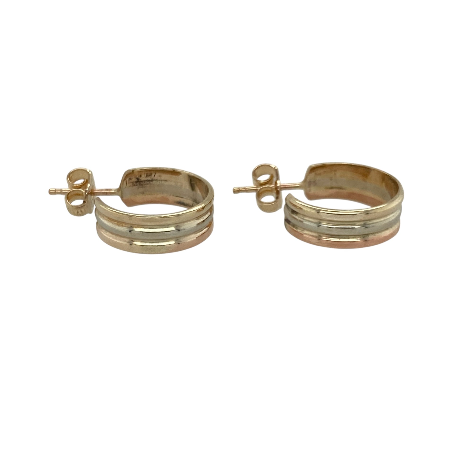 Add versatile elegance to your jewellery collection with these pre-owned 9ct yellow, rose and white gold half hoop stud earrings, combining three-tone styling with a timeless silhouette. A perfect choice for everyday wear or effortless day-to-evening accessorising.

Design: The earrings feature a classic half hoop shape, offering a gently curved profile that sits neatly against the ear.