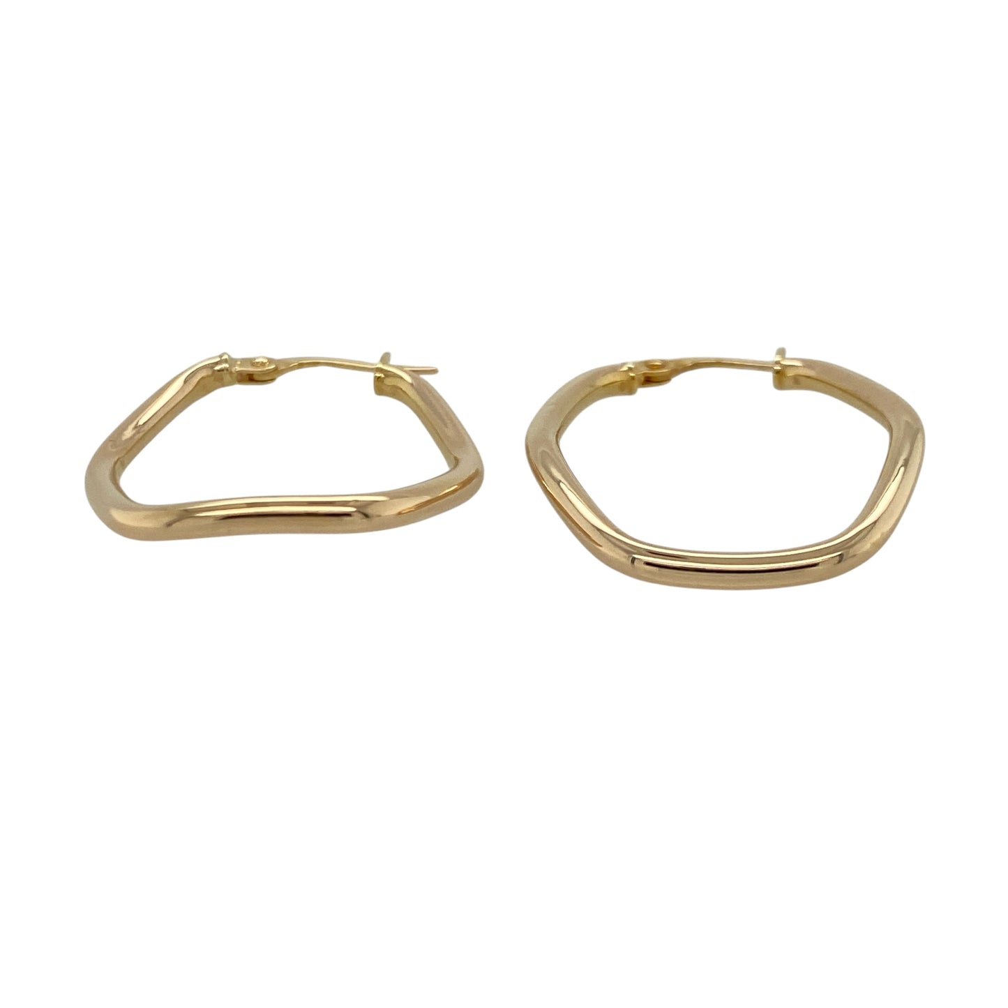 Add a modern edge to your jewellery collection with these pre-owned 9ct yellow gold hexagonal shaped tube creole earrings, offering a contemporary twist on a classic hoop design. Perfect for everyday wear with subtle geometric detail.

Design: The earrings feature a distinctive hexagonal-shaped creole silhouette, giving a structured and angular profile rather than the traditional round hoop. The tube style creates a smooth, polished surface with clean lines and a sleek finish.