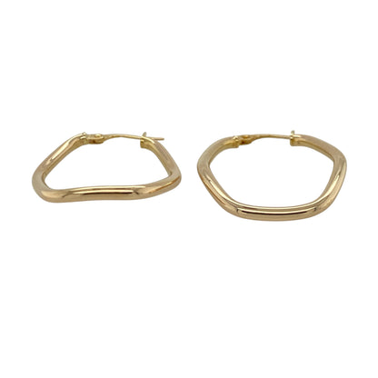 Add a modern edge to your jewellery collection with these pre-owned 9ct yellow gold hexagonal shaped tube creole earrings, offering a contemporary twist on a classic hoop design. Perfect for everyday wear with subtle geometric detail.

Design: The earrings feature a distinctive hexagonal-shaped creole silhouette, giving a structured and angular profile rather than the traditional round hoop. The tube style creates a smooth, polished surface with clean lines and a sleek finish.