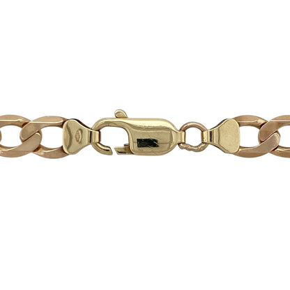 Make a bold statement with this pre-owned 9ct yellow/rose gold 21" curb chain, offering substantial weight and timeless styling. A standout piece ideal for wearing alone as a statement chain or pairing with a larger pendant.

Design: The chain measures approximately 7mm in width and features classic interlocking curb links, creating a strong and structured profile. The wide, flat links sit smoothly against the neckline, delivering a confident and eye-catching look.
