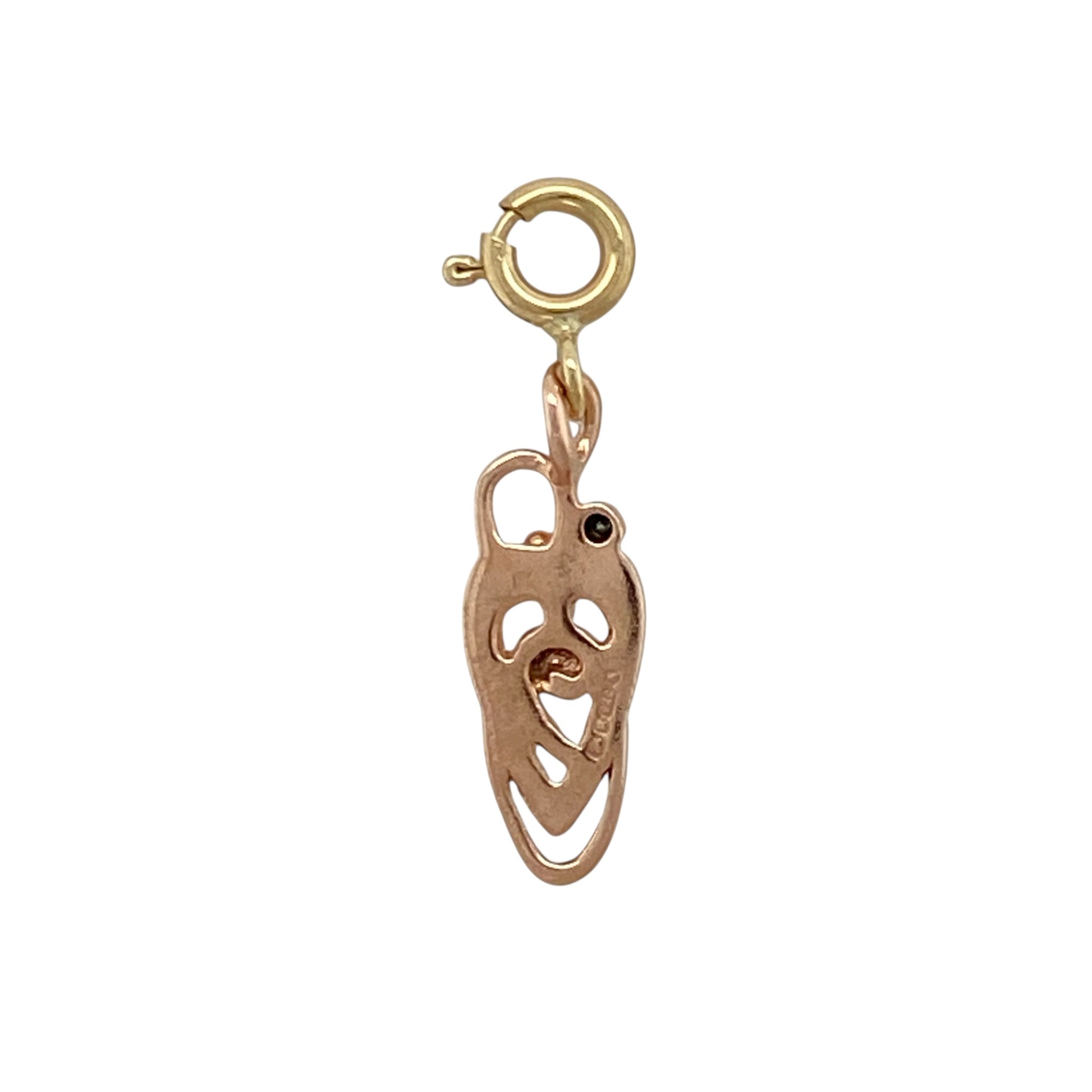 Celebrate meaningful design with this pre-owned 9ct yellow and rose gold diamond set Celtic style knot Clogau clip-on charm, combining symbolic heritage with delicate sparkle. A beautiful addition to a charm bracelet or necklace.

Design: The charm features an intricate Celtic knot motif, symbolising eternity and interconnectedness. Subtle diamond detailing adds refined brilliance, enhancing the flowing curves of the knot design while maintaining an elegant and wearable look.