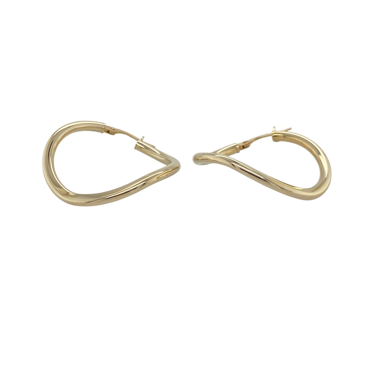 Add subtle movement and modern style to your jewellery collection with these pre-owned 9ct yellow gold wave hoop creole earrings, offering a contemporary twist on a classic hoop design. A versatile pair perfect for everyday wear.

Design: The earrings feature a traditional creole hoop silhouette enhanced by a gentle wave pattern flowing around the hoop. The curved detailing creates soft dimension and light reflection while maintaining a refined and wearable profile.