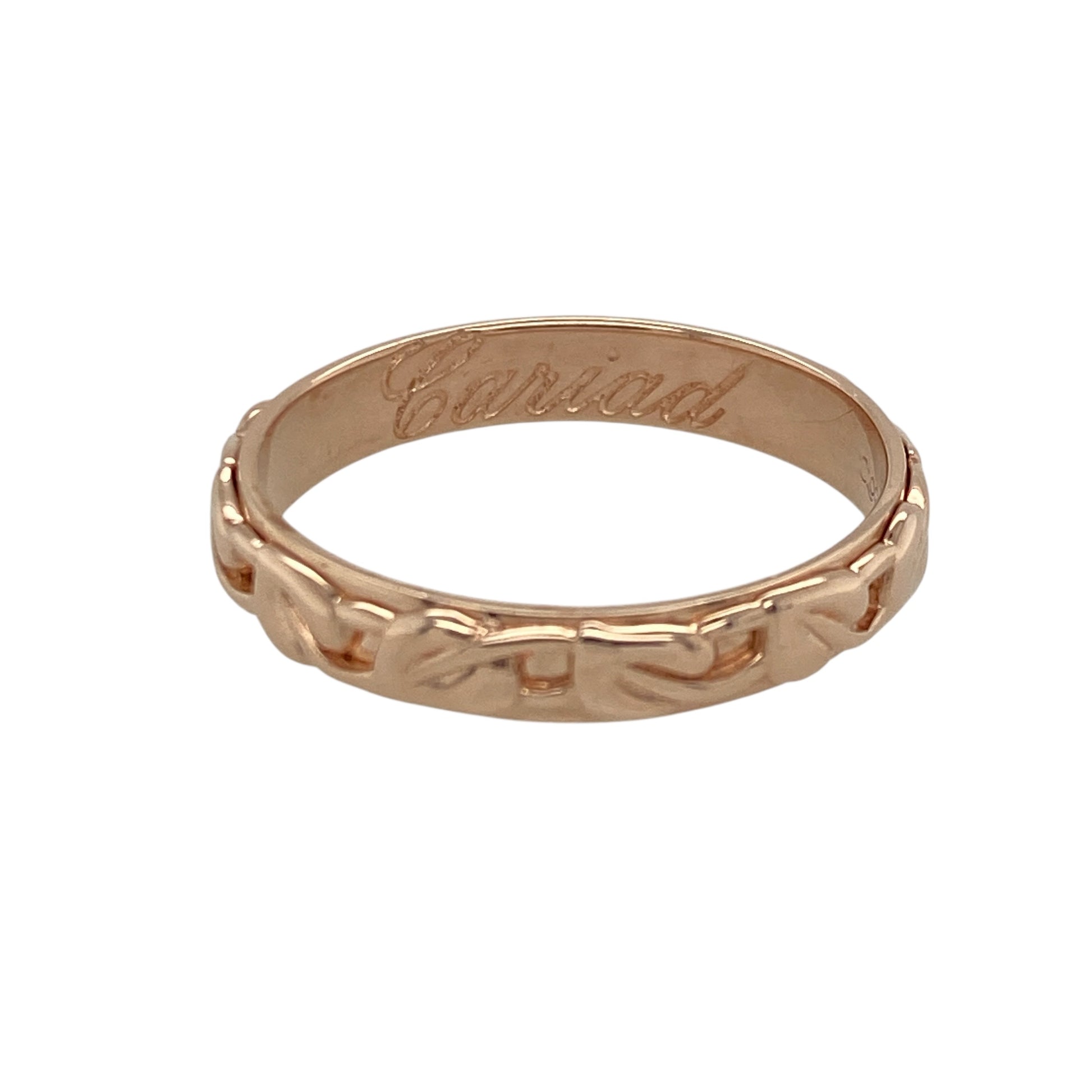 Celebrate love and meaningful design with this pre-owned 9ct rose gold Clogau Tree of Life Cariad band ring, combining romantic symbolism with elegant craftsmanship. A beautiful piece ideal for everyday wear or heartfelt gifting.

Design: The band measures approximately 4mm in width and features the iconic Tree of Life motif, symbolising growth, strength and family. The Cariad inscription, meaning “beloved” in Welsh, enhances the sentimental value and adds a distinctive touch to the design.