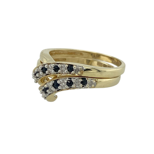 Add graceful detail and classic colour to your jewellery collection with this pre-owned 9ct yellow gold diamond and sapphire set double wishbone style band ring, offering elegant lines with refined sparkle. A distinctive piece perfect for everyday wear or meaningful gifting.

Design: The ring features a double wishbone silhouette, with each band measuring approximately 3mm wide at the front.