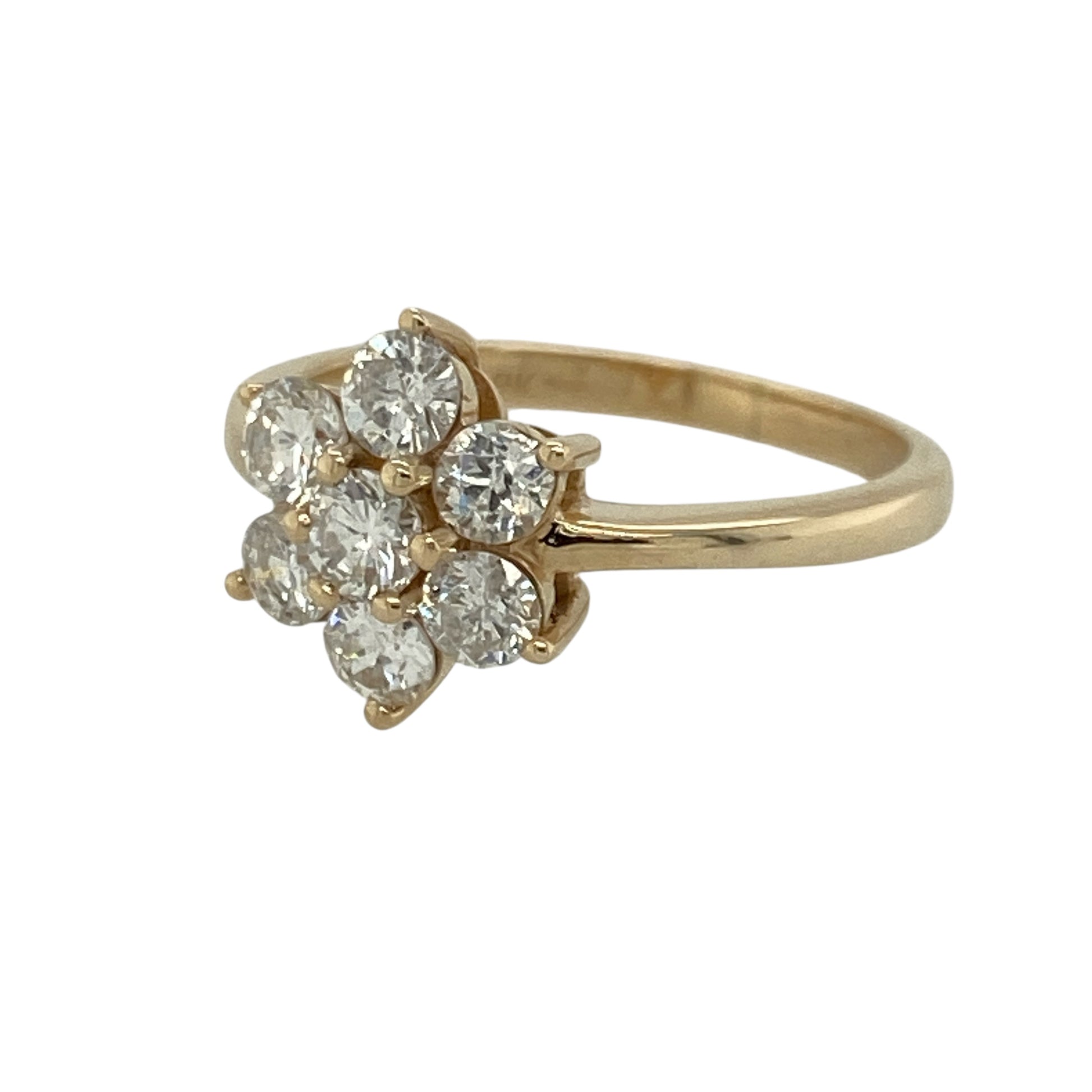 Make a bold statement with this pre-owned 9ct yellow gold diamond set flower cluster ring, combining impressive sparkle with timeless floral styling. A striking piece perfect for special occasions or standout everyday wear.

Design: The ring features a flower-inspired cluster head measuring approximately 11mm high, creating strong finger coverage and eye-catching presence. The cluster is composed of diamonds totalling approximately 1.05ct, arranged to maximise brilliance and light reflection.