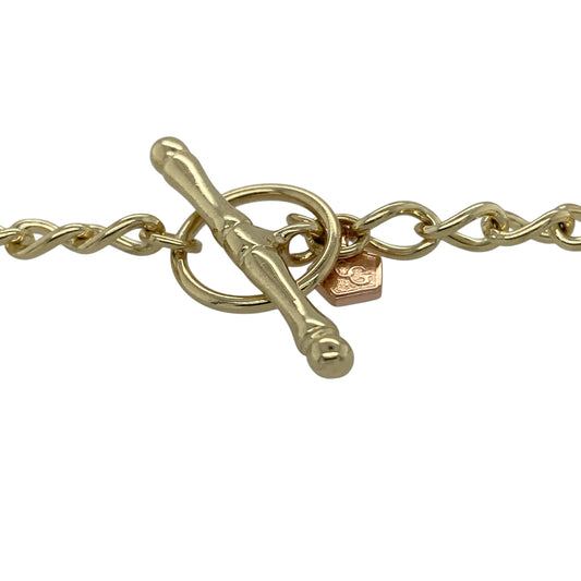 Celebrate meaningful Welsh design with this pre-owned 9ct yellow and rose gold 8" charm bracelet by Clogau, a beautifully detailed piece perfect for everyday wear or as a sentimental gift.

Design: This bracelet features a classic gold link chain adorned with four iconic Clogau charms: a Welsh dragon, sunflower, butterfly and Cariad heart. Each charm carries its own symbolism, from strength and heritage to love and new beginnings, creating a bracelet full of character and story.