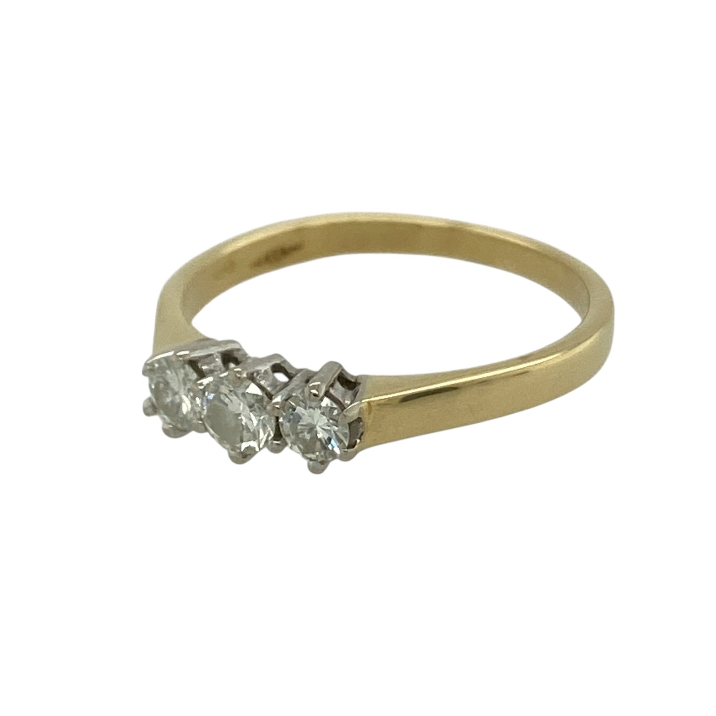 Celebrate timeless elegance with this pre-owned 18ct yellow gold diamond set trilogy ring, a classic and meaningful piece perfect for engagements, anniversaries or refined everyday wear.

Design: The ring features a traditional trilogy arrangement with three sparkling diamonds set across the centre, symbolising past, present and future. The balanced layout creates beautiful light reflection and a graceful, symmetrical profile on the finger.