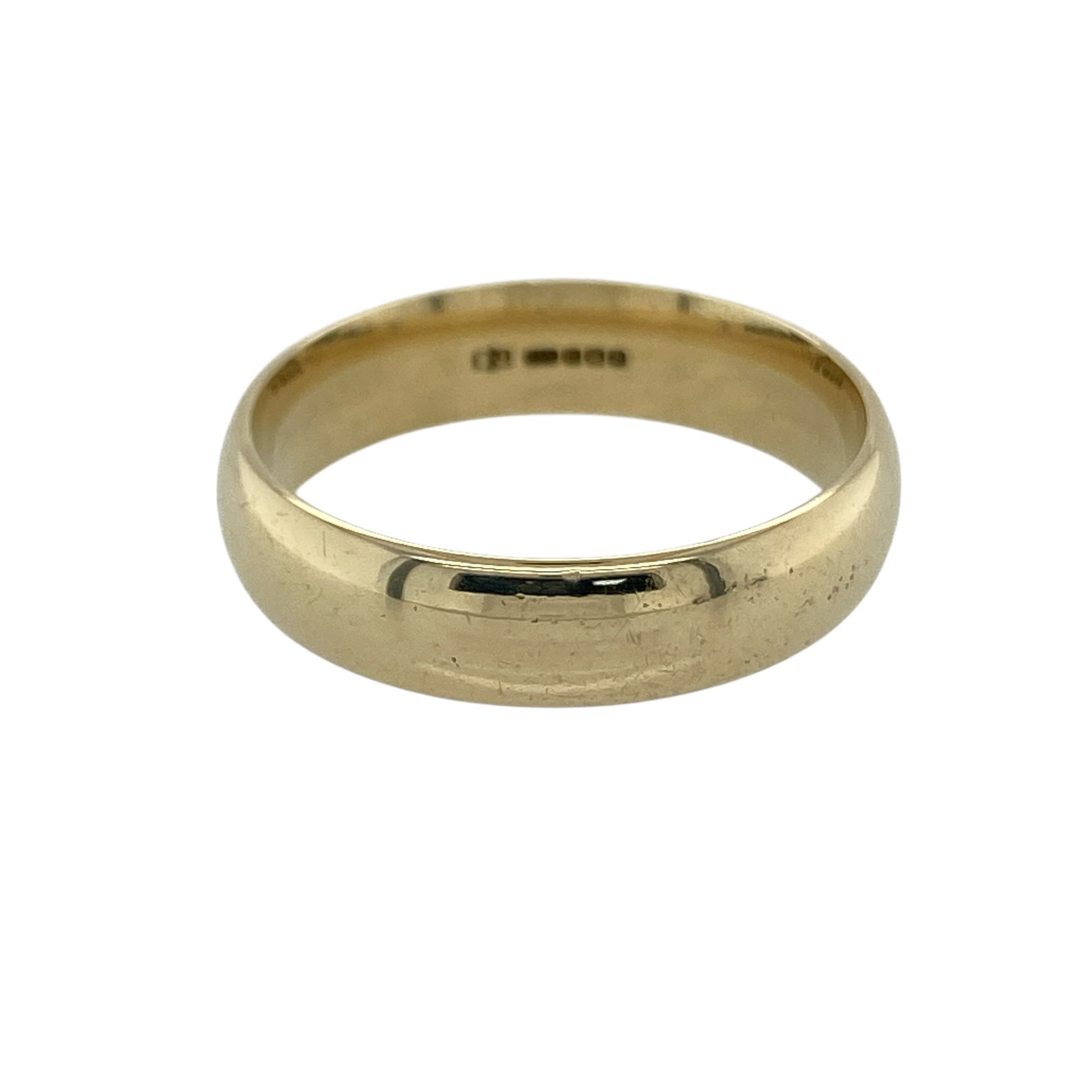 Mark your commitment with this pre-owned 9ct yellow gold 5mm wedding band ring, a timeless and versatile piece ideal for everyday wear or celebrating a special milestone.

Design: This ring features a classic 5mm wide band with a smooth, polished finish, offering a strong and balanced profile on the finger. The wider width provides confident presence while maintaining a clean and traditional look.
Material: Made from 9-carat yellow gold, the warm polished tone delivers a bright and classic finish.