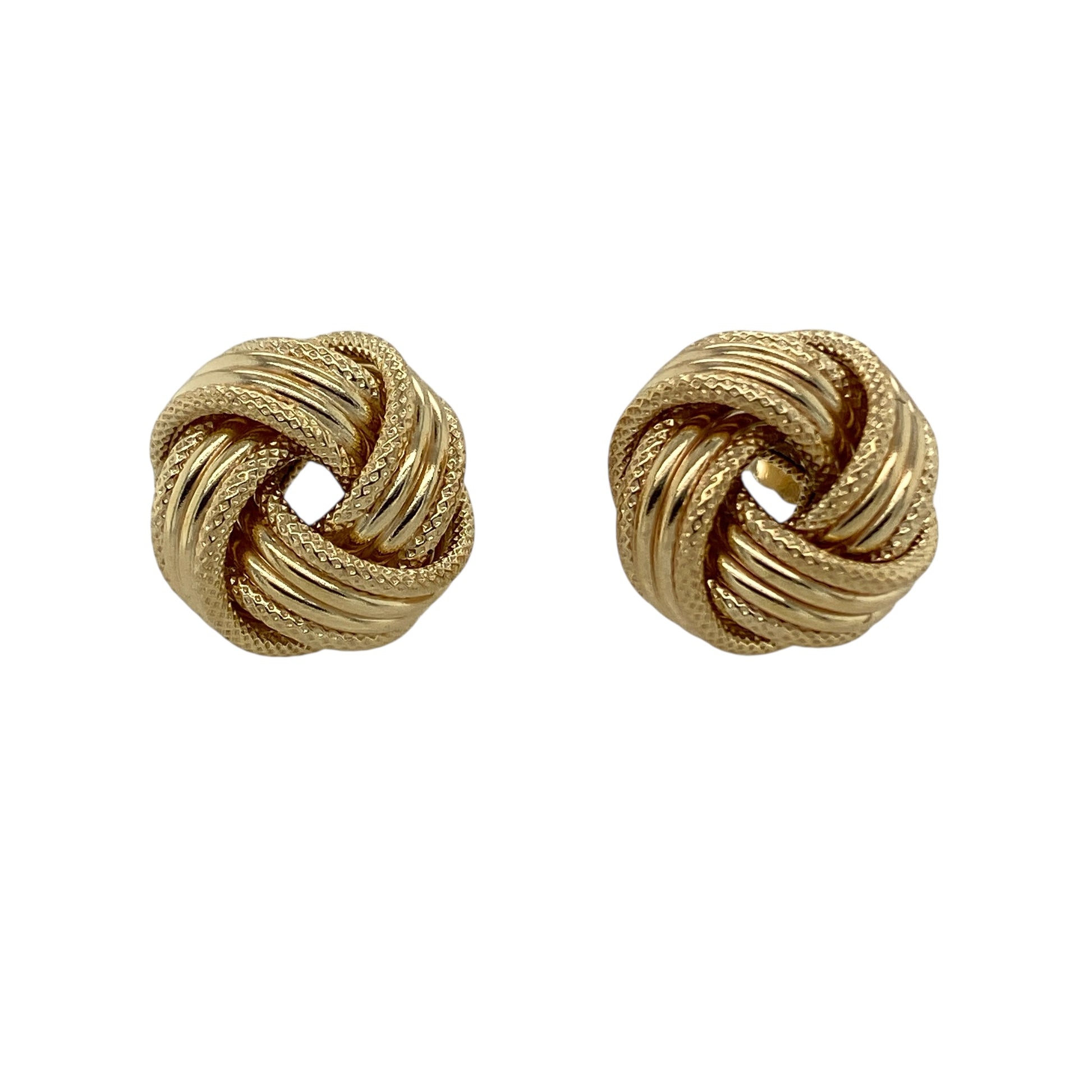 Add timeless texture to your jewellery collection with these pre-owned 9ct yellow gold 13mm knot stud earrings, a classic and versatile pair perfect for everyday wear or special occasions.

Design: Each earring features a traditional knot design measuring approximately 13mm in diameter, creating a bold yet elegant look on the ear. The interwoven gold detailing gives depth and dimension while maintaining a refined and timeless style.