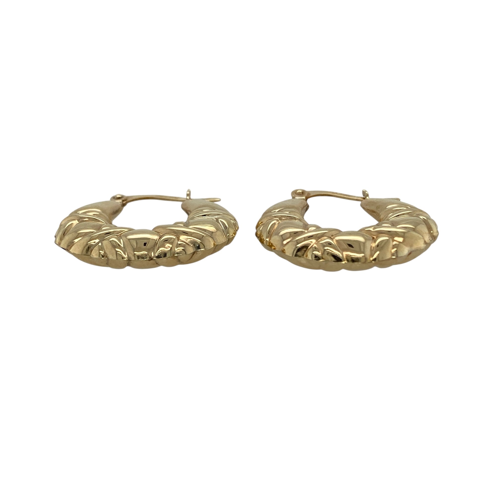 Add contemporary texture to your jewellery collection with these pre-owned 9ct yellow gold X shape patterned creole earrings, a stylish and versatile pair perfect for everyday wear.

Design: These earrings feature a classic creole hoop profile enhanced with an X shape patterned design, creating subtle texture and light reflection. The crossover detailing gives a modern twist to the traditional hoop style while maintaining a timeless look.