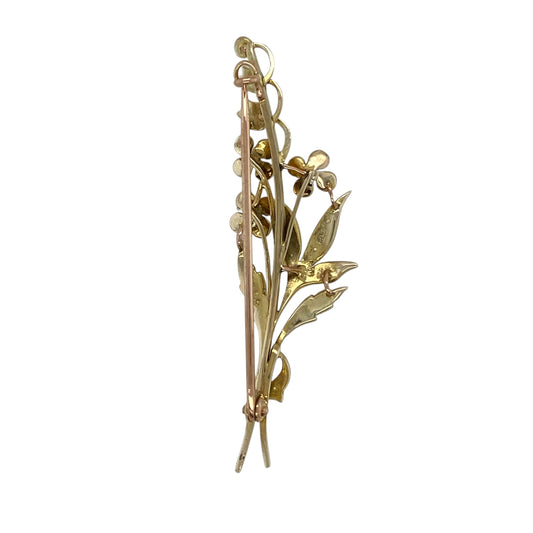 Add vintage elegance to your jewellery collection with this pre-owned 9ct yellow gold and seed pearl set flower style brooch, a charming and timeless accessory perfect for special occasions or classic styling.

Design: This brooch features a delicate flower-inspired design, beautifully detailed with lustrous seed pearls arranged to enhance the floral form. The intricate petal and centre detailing creates a graceful, vintage aesthetic with soft texture and dimension.