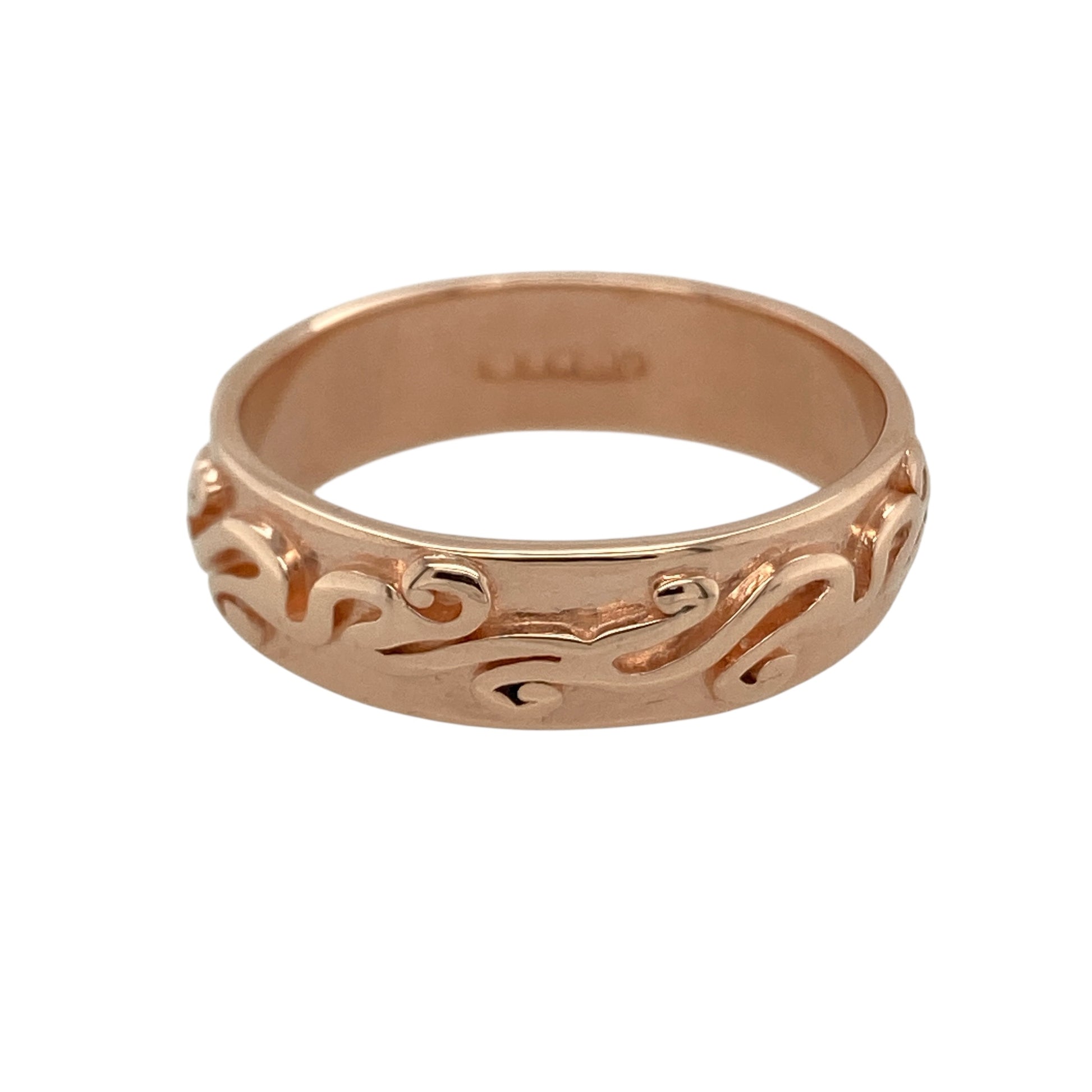 Make a bold statement with this pre-owned 9ct rose gold Clogau swirl patterned band ring, a striking and distinctive piece perfect for everyday wear or adding character to your jewellery collection.

Design: The ring features an eye-catching swirl pattern that flows continuously around the entire 7mm wide band, creating texture and movement from every angle. The full wrap design gives the ring strong presence on the finger while maintaining a refined and elegant look.