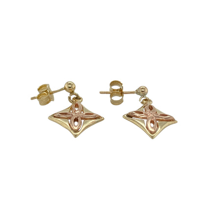 Add heritage-inspired elegance to your jewellery collection with these pre-owned 9ct yellow and rose Welsh gold Celtic knot cross style drop earrings, a distinctive and meaningful pair perfect for everyday wear or special occasions.

Design: These earrings feature a diamond-shaped drop design incorporating an intricate Celtic knot cross motif. The interwoven detailing symbolises eternity and connection, while the contrasting rose gold accents add warmth and depth to the overall look.
