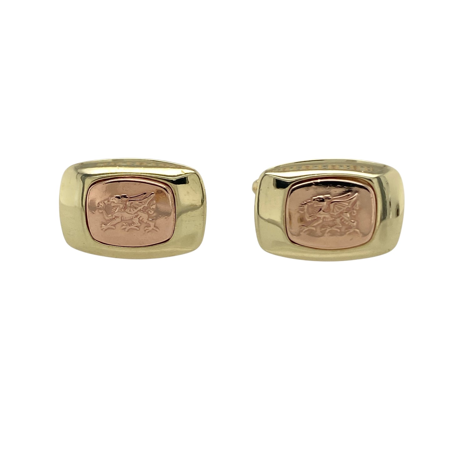 Bring heritage pride and bold style to your collection with these pre-owned 9ct yellow and rose gold Clogau Welsh Dragon cufflinks—a distinctive design rich in symbolism.

Design: Each cufflink features the iconic Welsh Dragon motif in yellow and rose gold, representing strength, heritage, and national pride.
Material: Made from 9-carat yellow and rose gold, the polished finish enhances the dual tones and intricate detailing of the design.