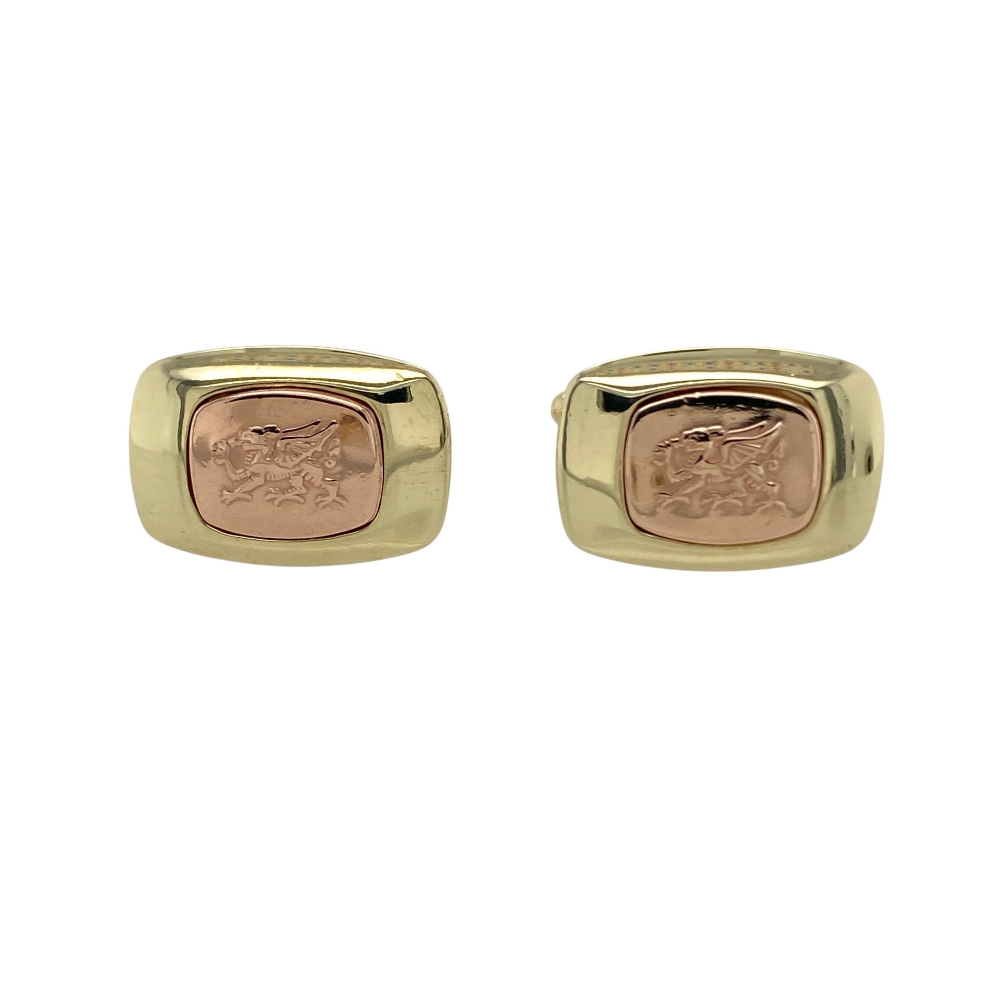 Bring heritage pride and bold style to your collection with these pre-owned 9ct yellow and rose gold Clogau Welsh Dragon cufflinks—a distinctive design rich in symbolism.

Design: Each cufflink features the iconic Welsh Dragon motif in yellow and rose gold, representing strength, heritage, and national pride.
Material: Made from 9-carat yellow and rose gold, the polished finish enhances the dual tones and intricate detailing of the design.